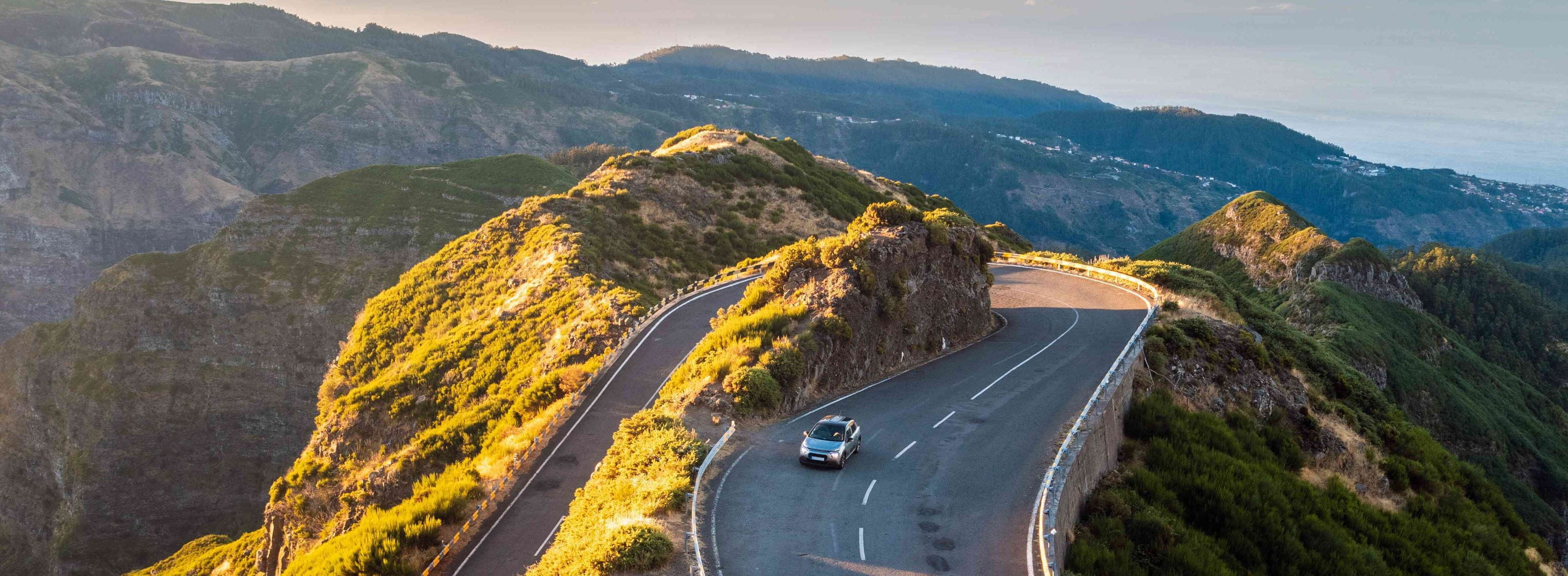car-driving-over-a-mountain