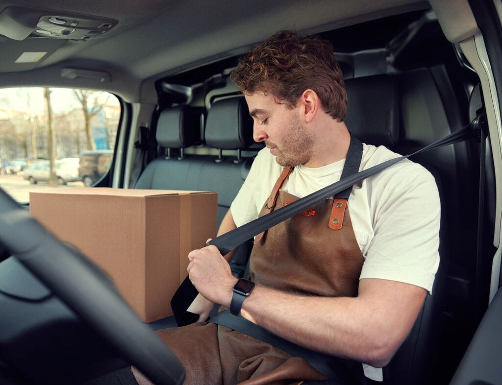 Man sitting in a van
